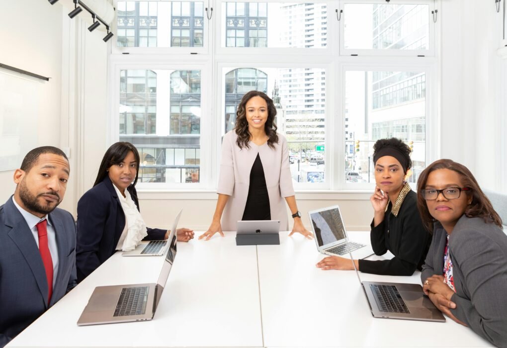 Business leadership team meeting in a modern office representing The Rise of Smart Businesses in 2026 and strategic corporate growth.